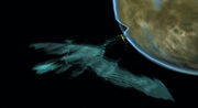 A Romulan Scimitar firing whilst cloaked