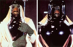 A Chelon attendant and lord in ceremonial armor