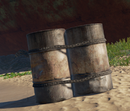 Barrels on land.