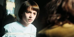 Will being interrogated by Joyce, Hopper, Jonathan, and Mike.