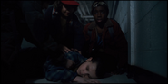 Eleven unconscious after using her powers to kill Connie Frazier and several agents.