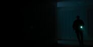 S1E5-Hopper in a dark hallway