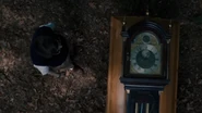 Clock.png (621 KB) Fred sees the clock embedded inside a coffin