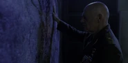 S3E1-Stepanov examining the wall.jpg (152 KB)