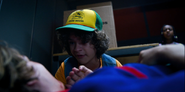 S03E07-Dustin trying to snap Steve out