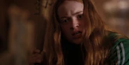 Max demanding Billy to obey her after hitting the bat to the floor near his crotch.