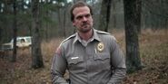 S1E2-Hopper talking to his officers