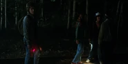 Max listening to Lucas and Dustin argue about Dart and getting her involved with the Upside Down.