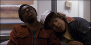 Dustin sleeping on Lucas's shoulder.