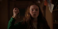 Max holding Billy's car keys so she and her friends can go burn the tunnels.