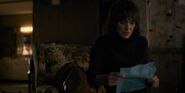 S1E5-Joyce reading a document