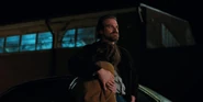 Joyce comforted by Hopper.