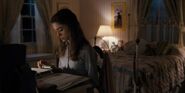 S1E1-Nancy studying in room