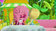 Lemon is giving Strawberry a wig and glasses