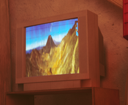 TV showing an Outside picture. The Slums
