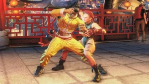 Jamie thrusting his shoulder into Cammy's midsection.