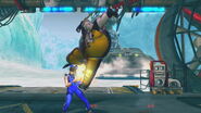 Rufus landing Falcon Kick against Ling Xiaoyu in Street Fighter X Tekken.