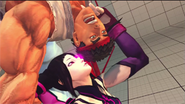 Juri "caressing" Ryu's face before slamming him.