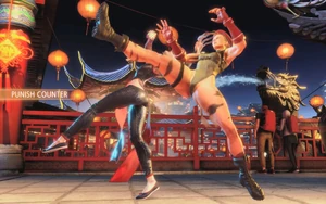 A.K.I sweeping Cammy off her feet during Whisper.