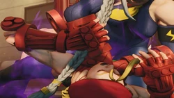 Decapre strangling Cammy.