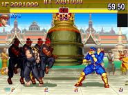 Akuma about to deliver the Raging Demon on M. Bison in Super Street Fighter II Turbo