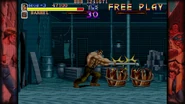 Mayor Haggar hitting barrels with a pipe.
