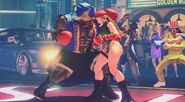 Balrog delivering a huge headbutt to Cammy.