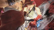 Ryu delivering a knee strike to Cammy's midsection.