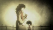 Flashback of a young Hugo with his mother