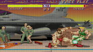 Zangief sweeping Guile in Street Fighter II: Champion Edition.