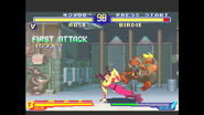 Rose sweeping Birdie in the Super Nintendo version of Street Fighter Alpha II.