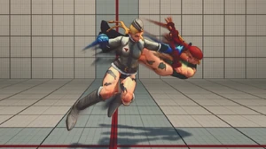  tossing her opponent away using Flying Neck Breaker.