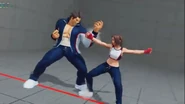 Akira spars with Daigo in their tracksuit costume