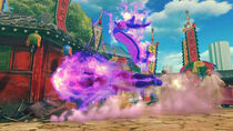 Psycho Crusher hitting Juri in Super Street Fighter IV.