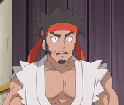 A Karate Master dressed as Ryu in Pokemon Journeys Episode 34