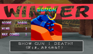 "Show gun I death!" -> "Shouganai desu!" = "It's unavoidable!" (Japanese "translation": "Well, I'm not giving up!")