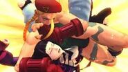 Cammy breaking Juri's arm and neck in Super Street Fighter IV.