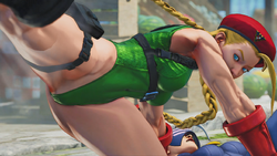 Cammy kicking away a police officer.