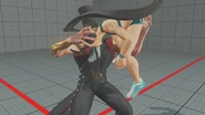 G picking up his opponent as part of his V-Trigger.