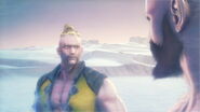 A slim Rufus standing alongside with a slim Zangief from within their ending.