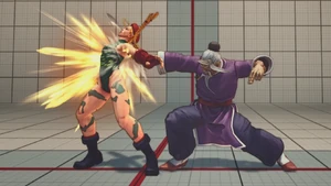 Gen striking the pressure point on 's back using Hozen.