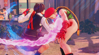 Sakura hits Cammy with her Shouoken at the end of her Critical Art.