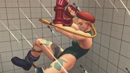 Ibuki barraging Cammy with kunais using Hashinsho.