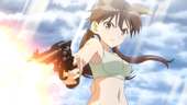 Trude firing a pistol