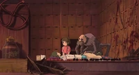 Kamajī and Chihiro helping Haku after he is injured.