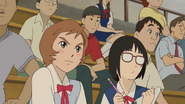 Hiromi, with her friend, attending Tsuge's match.