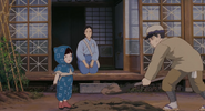 The siblings with their mother in their original home.