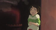 Chihiro startled by the hissing noise at the boiler room