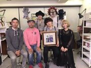 Yonebayashi with the folk group SEKAI NO OWARI. They performed the film's theme song, Rain.
