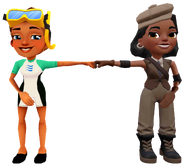 Kim in her Dive Outfit fist bumping Alia in her Sneaky Blinders